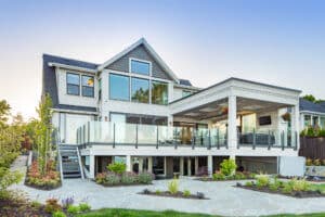 Custom home under construction in Victoria, BC showcasing detailed craftsmanship and structural framing