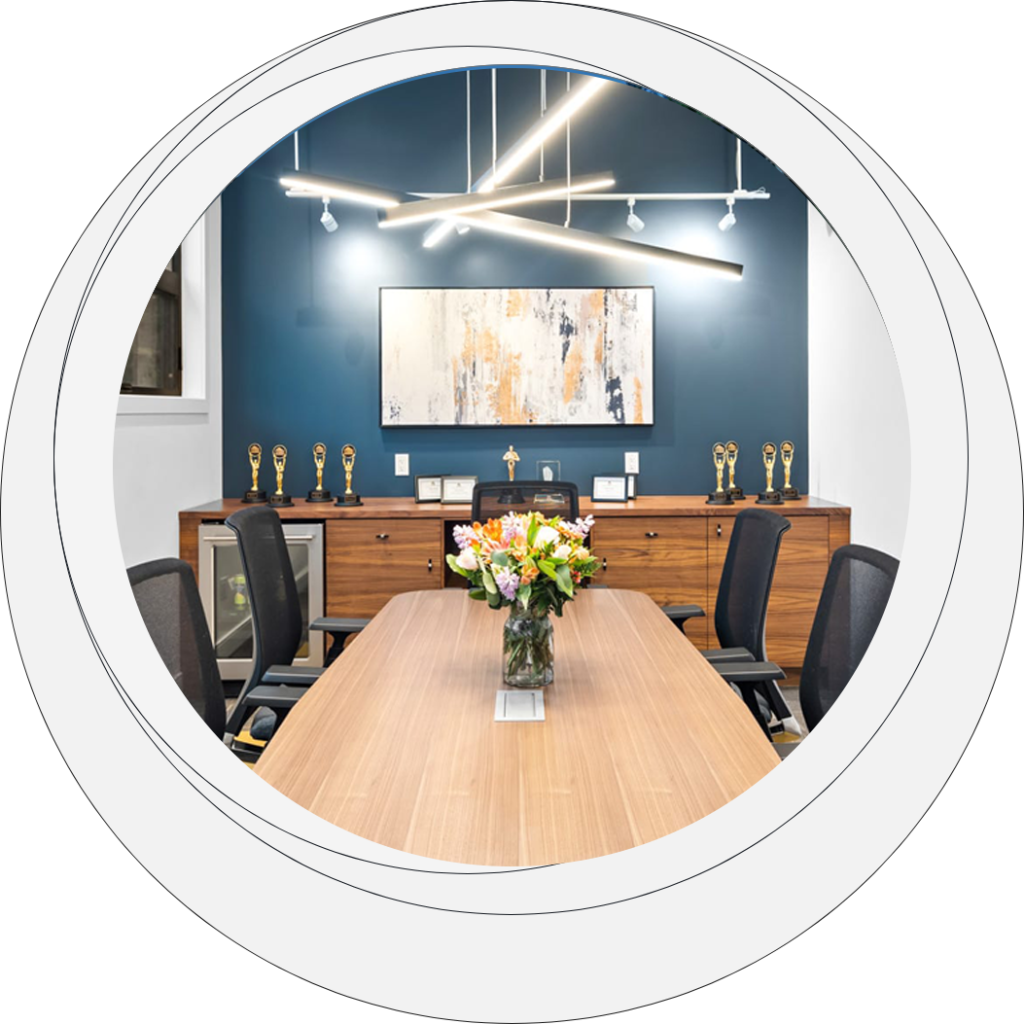 Modern conference room design featuring a wooden table, stylish chairs, and contemporary lighting, ideal for a Custom Home office setting.