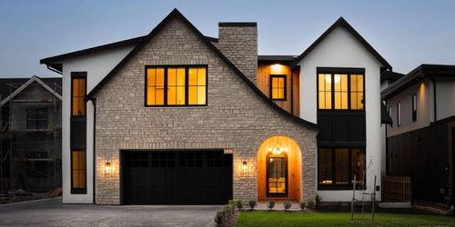 Custom home exterior with articulated roofline built by LIDA Homes in Victoria